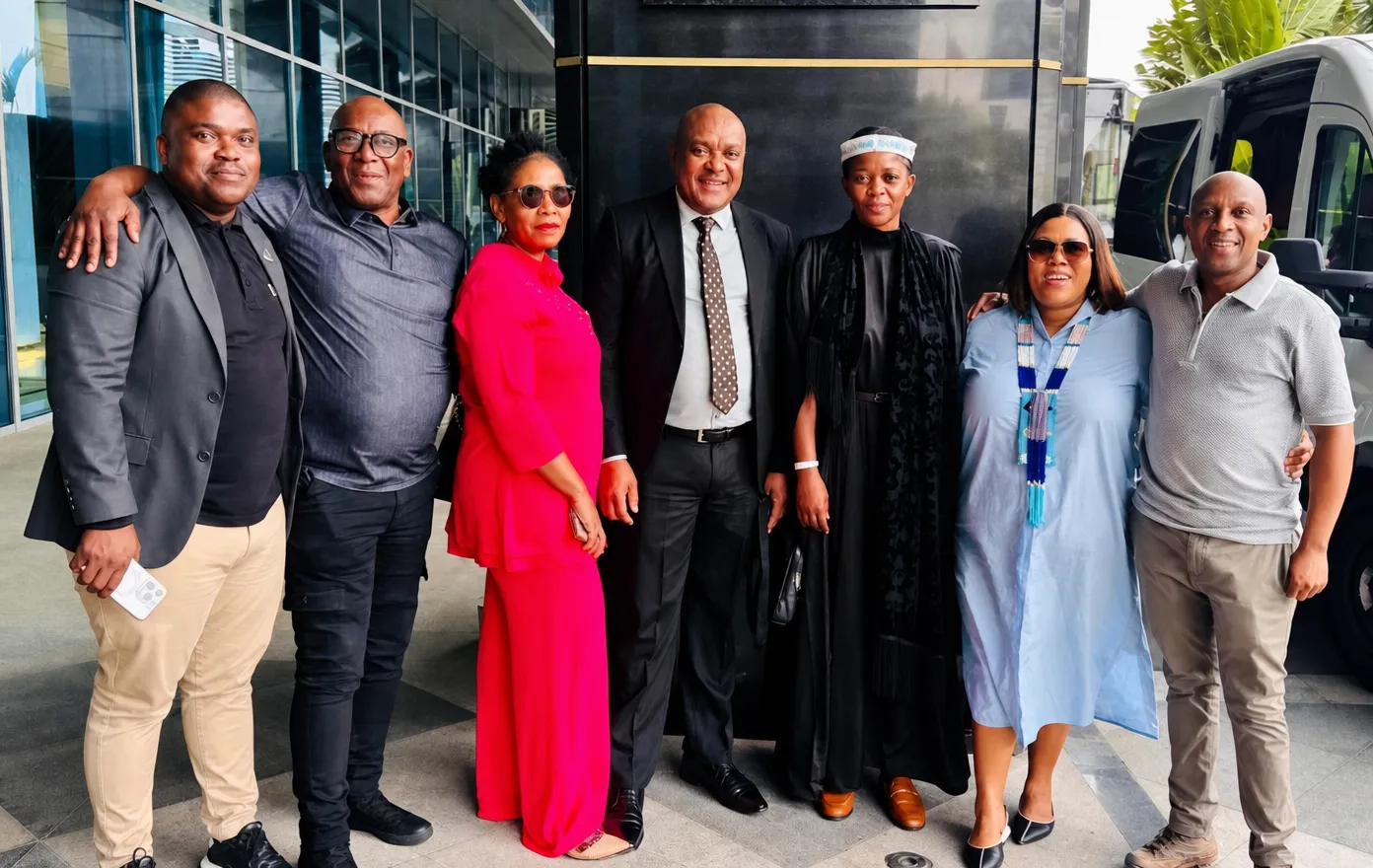 South African government officials, who accompanied the families to Angola.